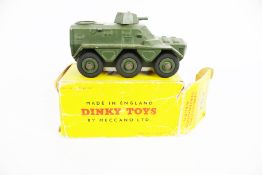 A Dinky Armoured Personnel Carrier 676. In the original box.