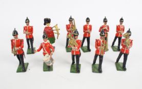 Eleven Britains model soldiers. Comprising regimental band pieces.