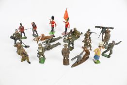 A collection of lead figures and accessories.