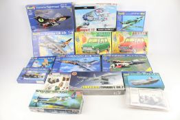 A collection of assorted plastic model kits.
