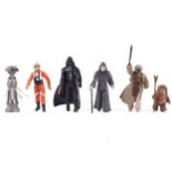 A collection of six Star Wars figures.