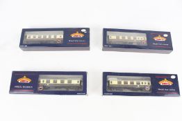 Four Bachmann OO gauge coaches.