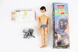 A Palitoy Action Man SAS Key Figure. With action grip hands and eagle eyes, stamped 1978.