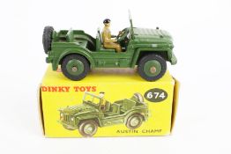 A Dinky Austin Champ 674. In military green livery, in the original box.