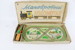 A vintage clockwork train set.