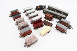 A collection of OO gauge model railway wagons.