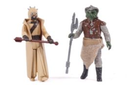 A collection of two Star Wars figures.