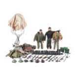 Three Palitoy Action Man figures. With a range of clothes and accessories, etc. One missing head.