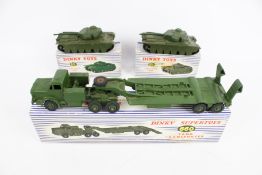 A collection of Dinky military diecast vehicles.