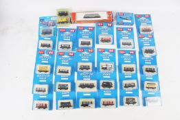 Thirty Peco N gauge goods wagons.