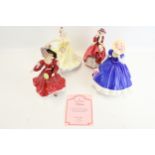 Four Royal Doulton figures of ladies.