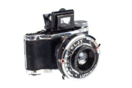 A vintage ELJY Lumiere sub-miniature film camera.