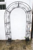 A metalwork garden archway.