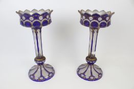 A pair of late 19th century clear, white and blue glass lustres.