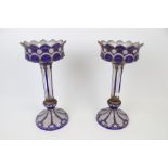 A pair of late 19th century clear, white and blue glass lustres.