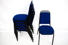 A set of five stacking office chairs.