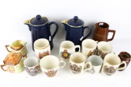A collection of assorted vintage china. Including commemorative mugs, two Denby coffee pots, etc.
