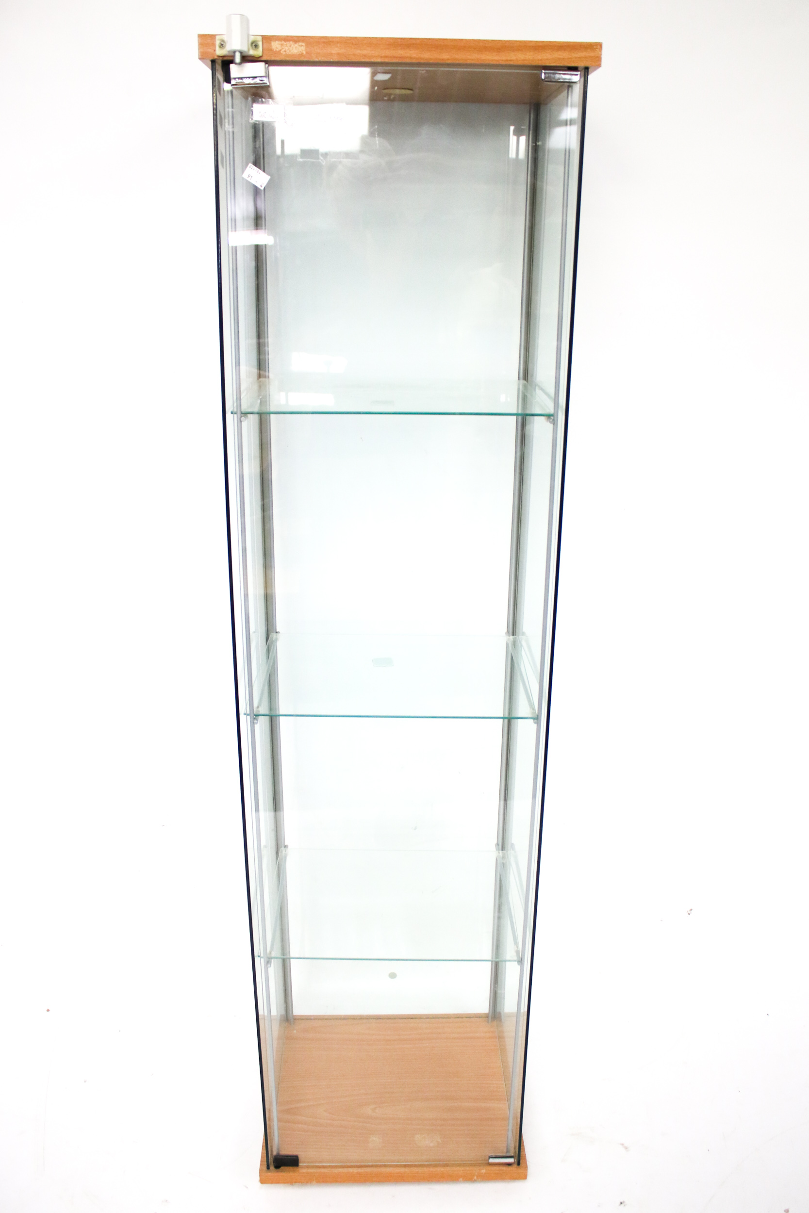 A shop glass display cabinet. With three glass shelves.