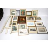 A large collection of assorted pictures and a white painted easel.