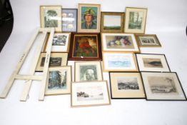 A large collection of assorted pictures and a white painted easel.