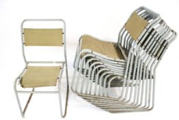 Ten mid-century industrial style tubular metal stacking canvas chairs, Pel Cox.