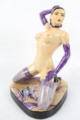 An exclusive Peggy Davies ceramic figure of a woman.