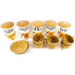 Five 1970s Crown Devon kitchen storage jars and Tams soup bowls and saucers.