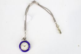 A vintage white metal and blue enamel fob watch.