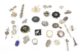 A collection of British and foreign white metal and silver jewellery.