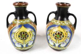A pair of Lindus Arnhem twin-handled vases. In the 'Duw' pattern, H14.