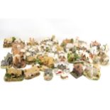 A collection of Lilliput Lane cottages. Including 'The Christmas Present', 'Frosty Morning', etc.