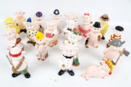 A collection of 'Piggies' ceramic figures. Including 'Trotter of the yard' and 'Swine Lake', etc.