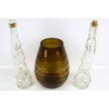 A vintage optic ribbed vase and two novelty French bottles.