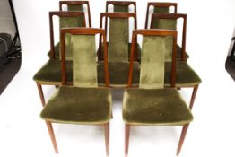 A set of eight G-Plan (red label) dining chairs.