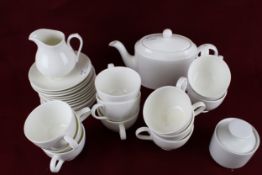 A contemporary white porcelain twelve piece tea service.