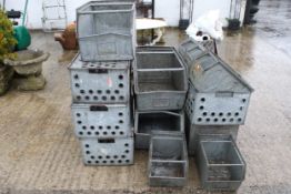 A collection of vintage metal industrial larger boxes.