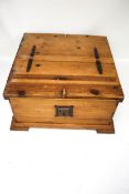 A large contemporary wooden coffee table twin lid chest.