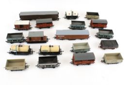 Eighteen OO Gauge wagons. Mostly Hornby examples, including tankers and box cars, etc.