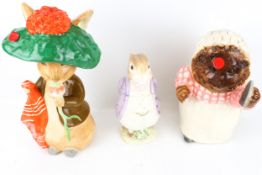 Three assorted Beatrix Potter ceramic figures.