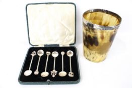 A white metal rim horn beaker and a boxed set of 6 Indian white metal spoons.