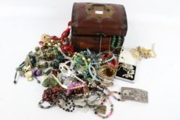A box of assorted costume jewellery. Including mostly necklaces, etc.