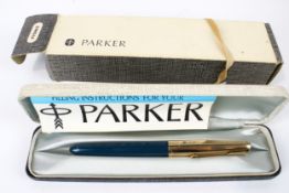 A vintage Parker 51 fountain pen.