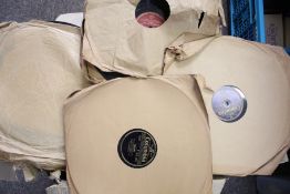 A collection of assorted 78 RPM 10 inch records.