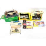 A collection of eight assorted diecast model vehicles boxed.