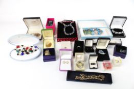 Twenty boxes of assorted costume jewellery. Including necklaces, bracelets, etc.