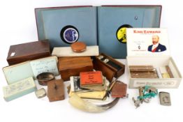 An assortment of collectables. Including a tea caddy, dominoes set, etc.