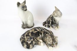 Three Winstanley pottery cats.