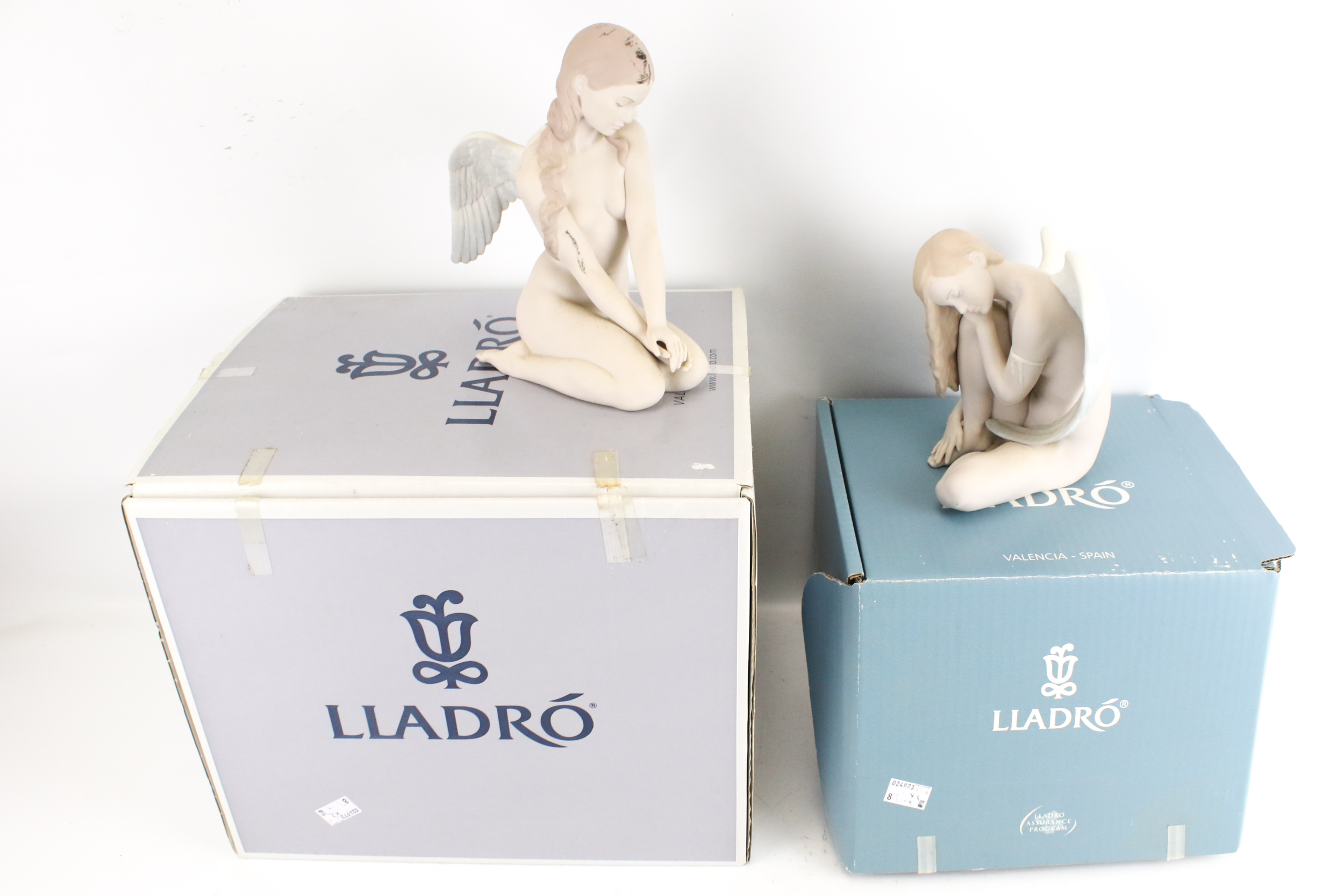 Two Lladro figures.