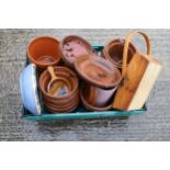 A quantity of assorted vintage terracotta garden plant pots.