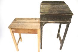 Two vintage wooden school desks.